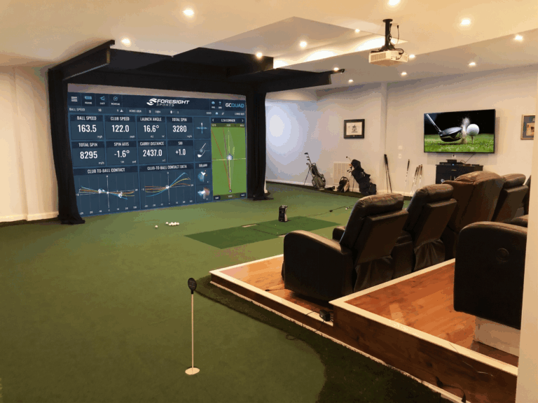 Foresight Sports GCQuad launch monitor integrated into a high-performance golf simulator bay by Sims & Greens, featuring precision-aligned hitting turf and high-fidelity 4K impact screen.