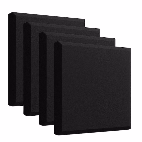 Acoustic sound absorbing wall panels installed in a room